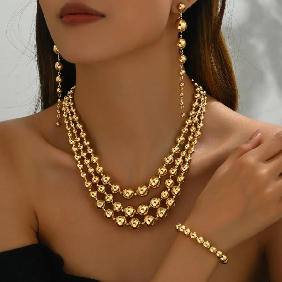 Silver jewelry set featuring beaded and beaded