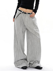 Men's grey striped wide-leg sweatpants with a relaxed fit and pleated texture.