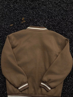Plus-size coffee brown bomber jacket with white striped collar and cuffs.