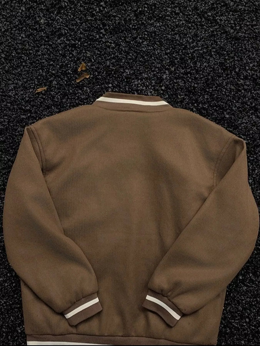 Plus-size coffee brown bomber jacket with white striped collar and cuffs.