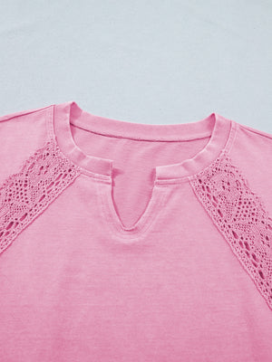 Pink mineral wash cotton tee with notched neckline and crochet lace detail.