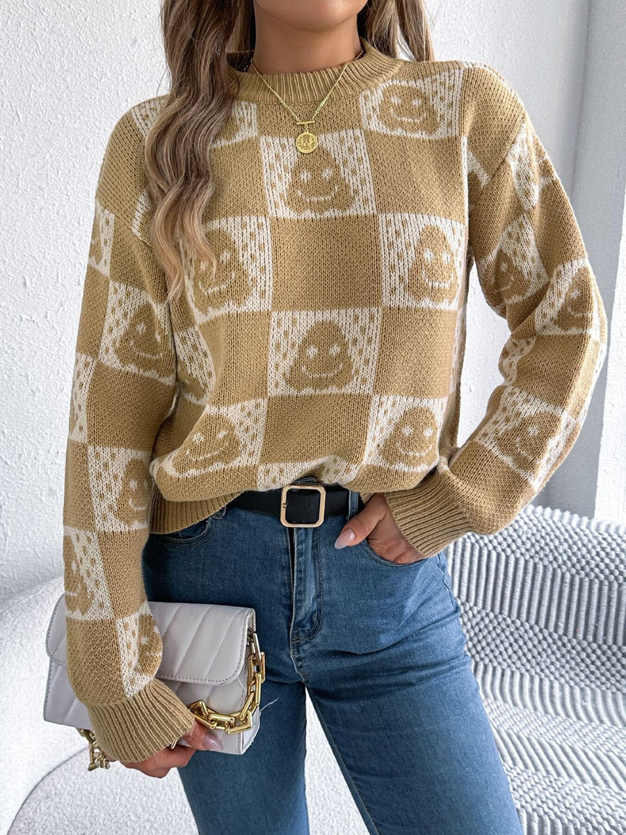 cream pullover sweater with ribbed cuffs and long sleeve