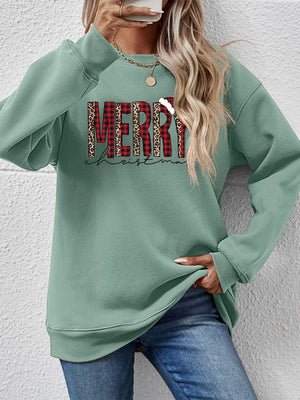 Sage graphic sweatshirt with Merry Christmas text in buffalo plaid and leopard print.