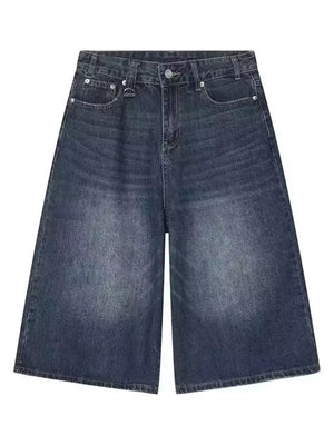 Dark wash wide-leg denim culotte shorts with a vintage feel.