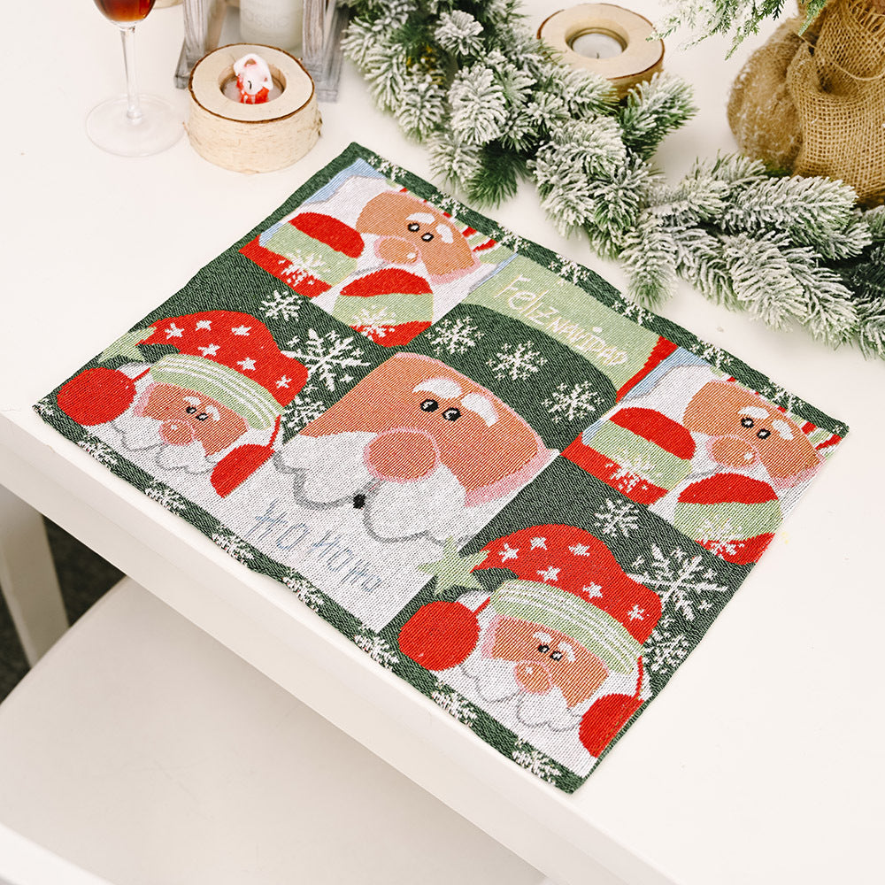 Green placemat with Santa Claus faces and snowflakes pattern