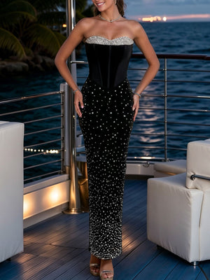 100% polyester Care instructions: Machine wash cold maxi dress in Black with fitted silhouette