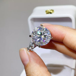 925 sterling silver,Moissanite Care instructions: Avoid wearing during exercise, ring in clear with fitted silhouette