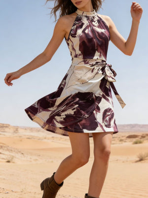 burgundy mini dress featuring tied waist and abstract-print