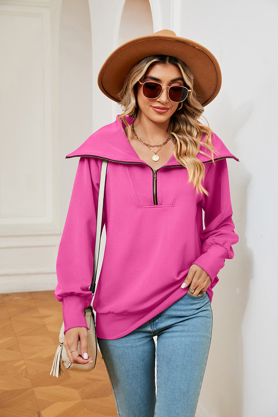 Fuchsia pink wide collar zip-through sweatshirt with a relaxed fit and long sleeves.