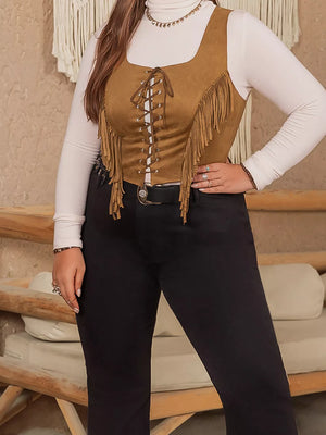 Caramel faux suede vest with fringe detail and lace-up front, cropped length.