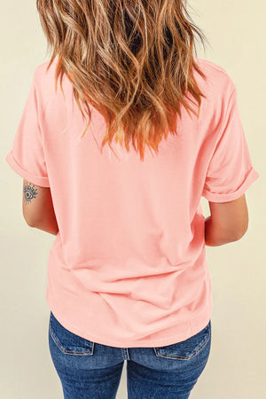 Watermelon pink basic tee with rolled short sleeves and a round neckline.