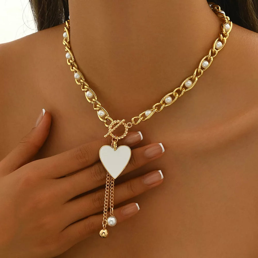 necklace in Gold with heart pendant and choker length