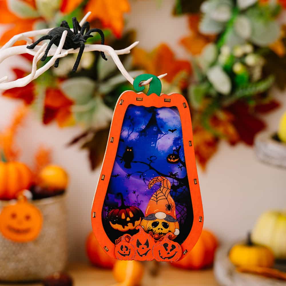 Spooky Silhouette Lantern Trio ornament with Halloween scene inside.