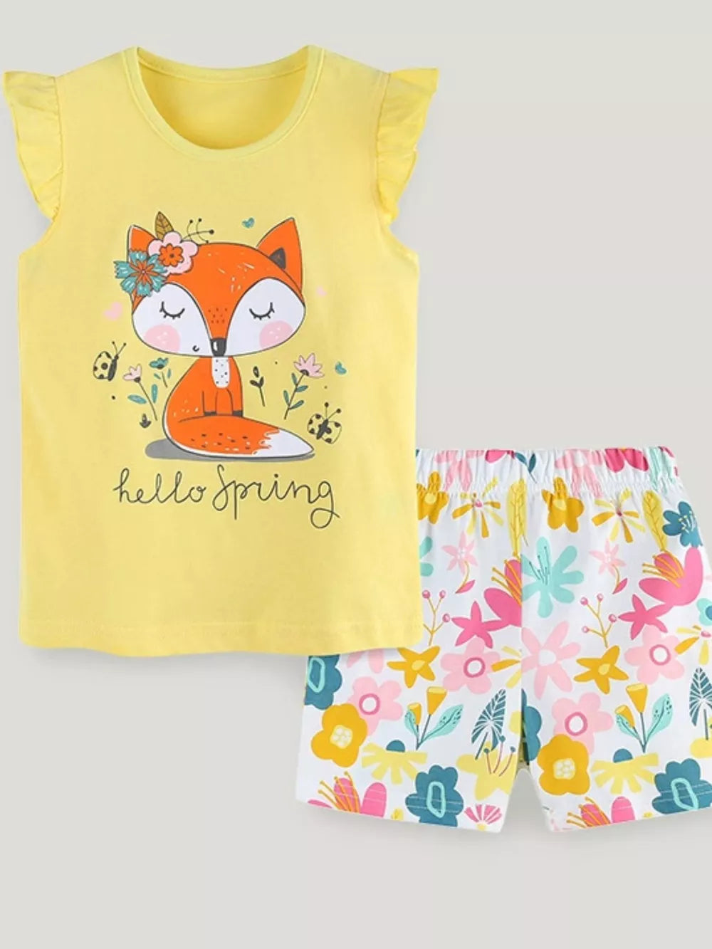 Yellow toddler graphic tee with fox and floral print shorts.