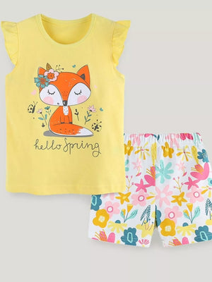 Yellow toddler graphic tee with fox and floral print shorts.