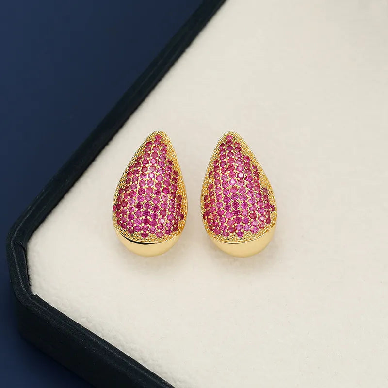 Pave teardrop stud earrings with gold base and hot pink stones