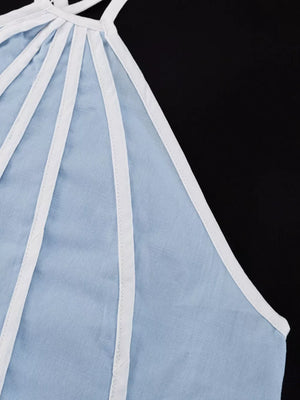 Light blue halter top with white trim and a paneled design.
