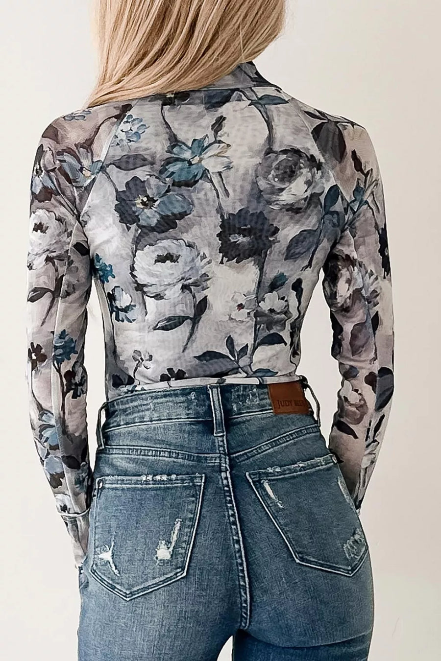 Sheer floral high neck long sleeve shirt in gray with blue flowers, polyester.
