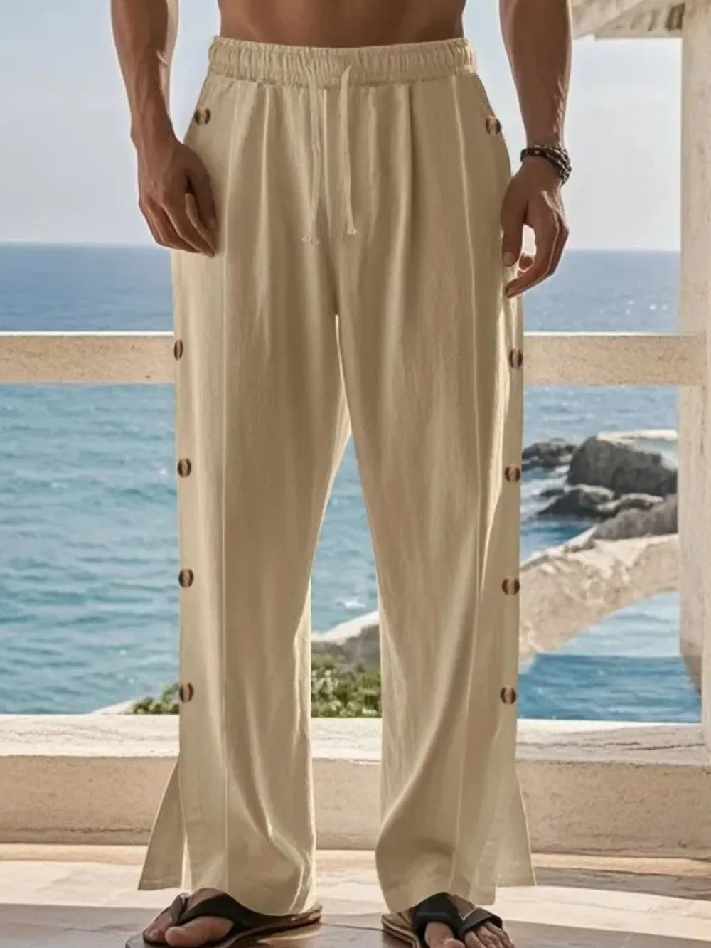 Khaki linen palazzo trousers with side buttons and drawstring waist.