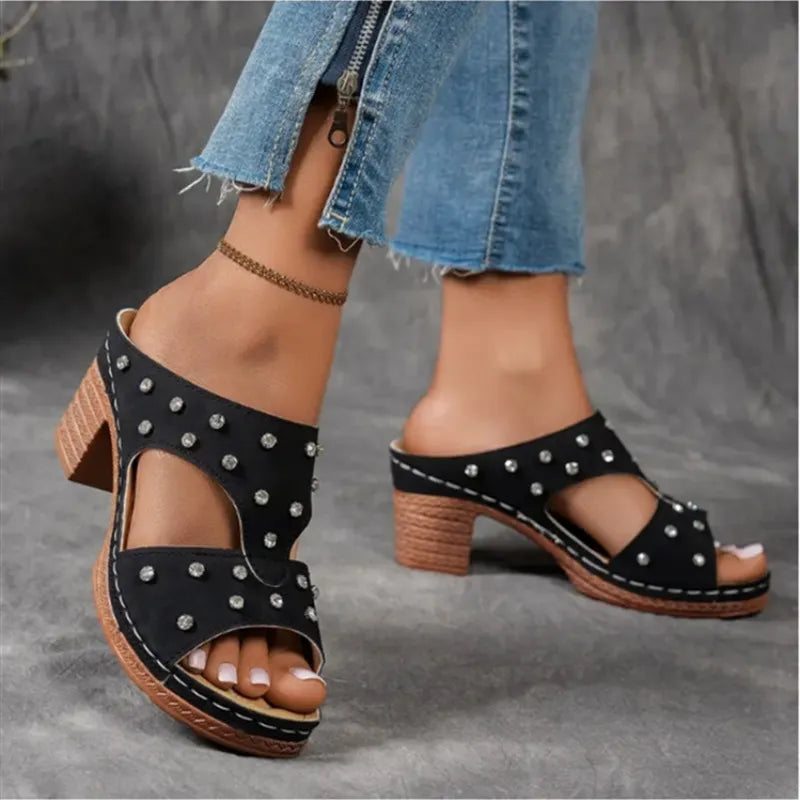 Black studded cutout platform mule sandals with stacked heel