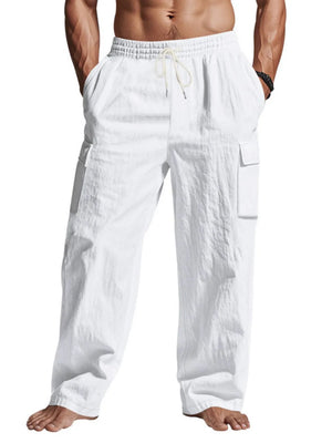 White relaxed-fit linen cargo pants with drawstring waist and side pockets.