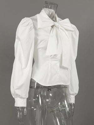 optic white blouse with puffed sleeves and puff sleeve