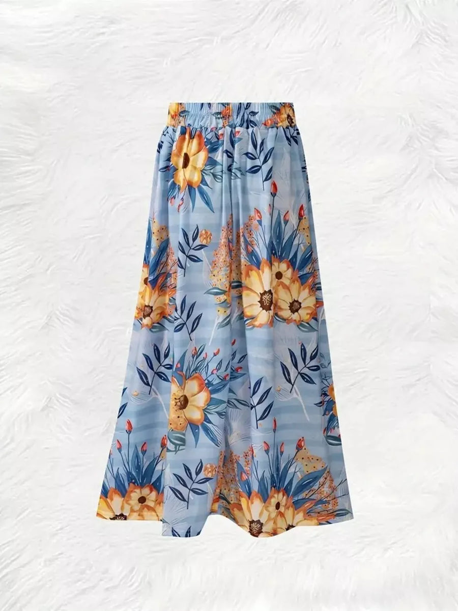 Blue floral print a-line skirt with elastic waist and horizontal stripes.