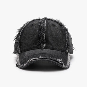 Black distressed denim baseball cap with frayed edges