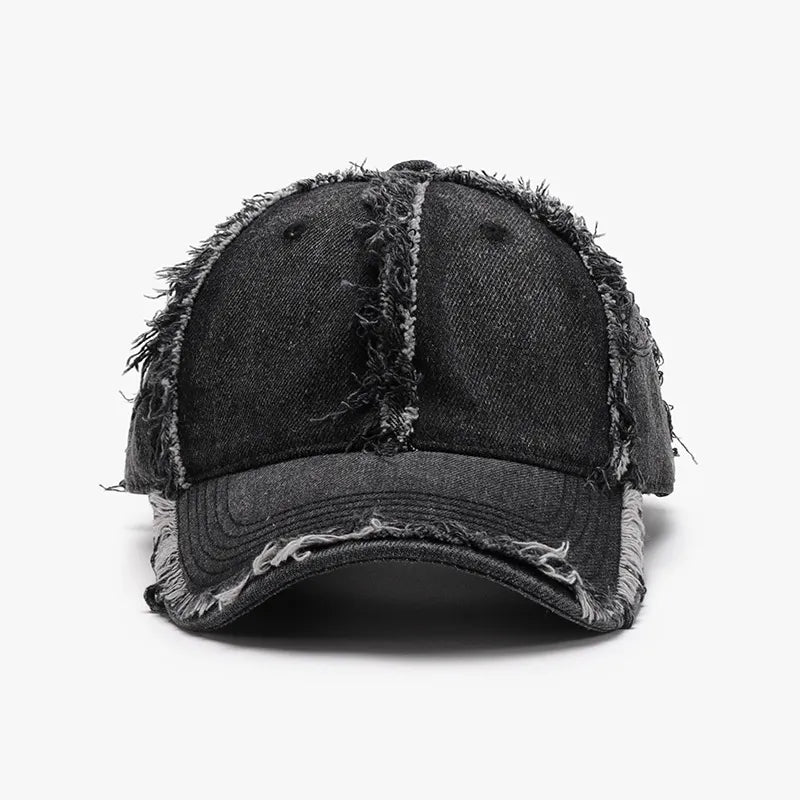 Black distressed denim baseball cap with frayed edges