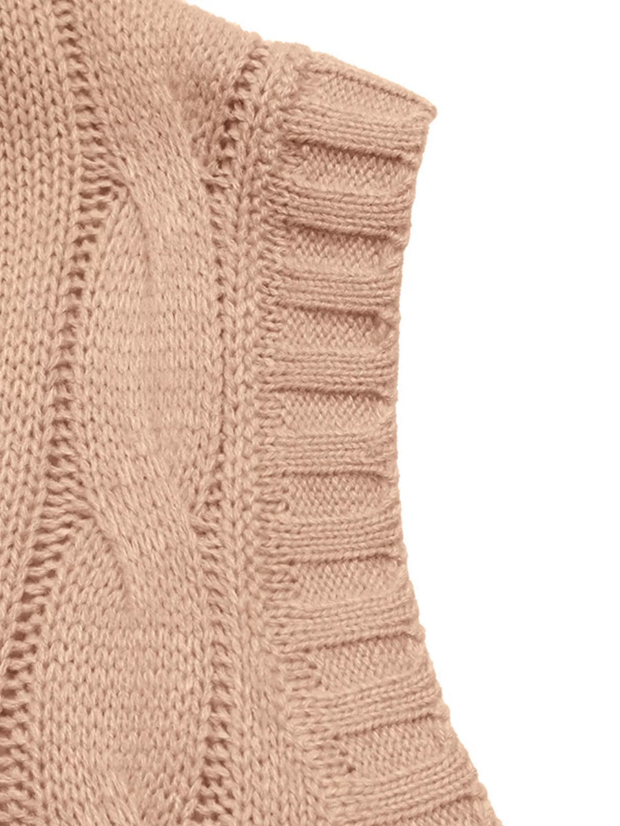 Pink cable knit sweater vest with ribbed trim and textured knit detail.