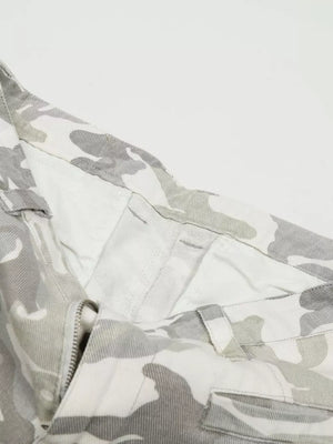 Camouflage wide-leg cargo pants with button fly and belt loops.