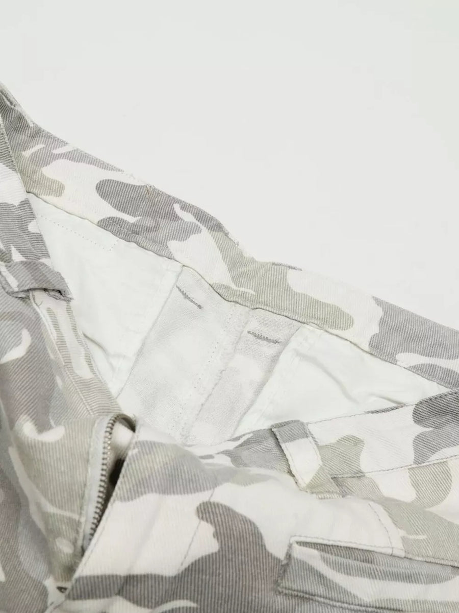 Camouflage wide-leg cargo pants with button fly and belt loops.