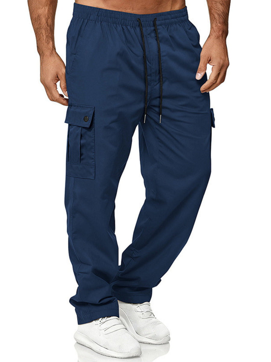 Navy blue cargo pants with adjustable drawstring waist and button flap pockets.