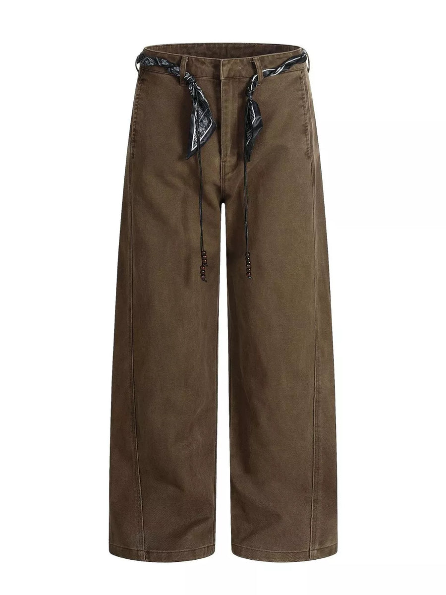 Belted wide-leg maternity pants in dark brown with patterned tie belt and beaded drawstring.
