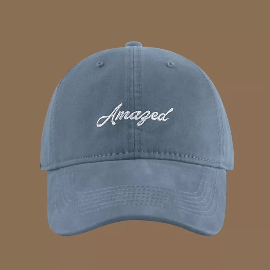 Mist Blue cotton baseball cap with white embroidered "Amazed" text.