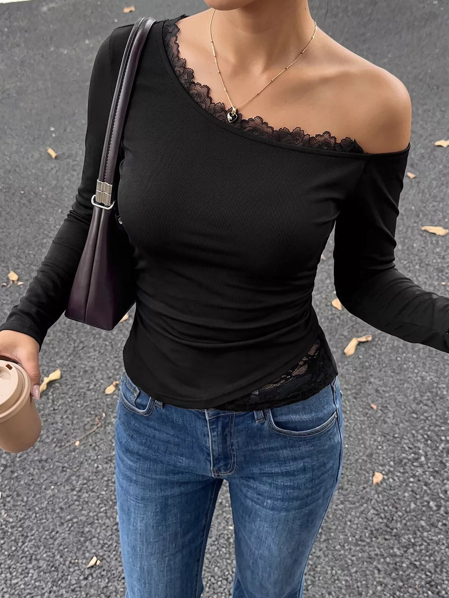 black one-shoulder top with stretch and long sleeve
