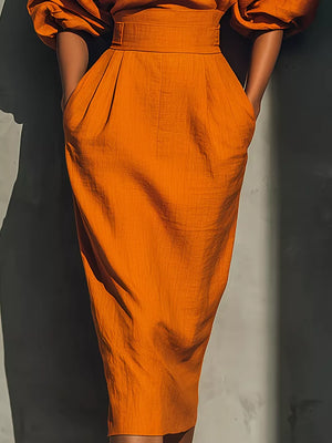 100% polyester Care instructions: Machine wash cold midi dress in Orange with fitted silhouette