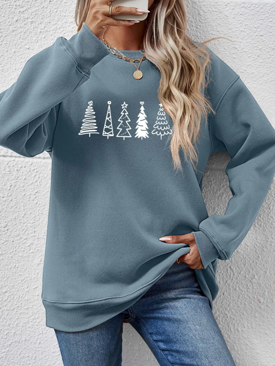 Air Force Blue oversized sweatshirt with white festive tree line graphic, crewneck, long sleeves.