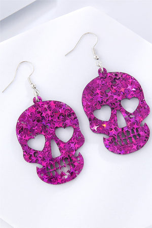 Glitter skull dangle earrings with heart-shaped eye cutouts in multicolor acrylic.