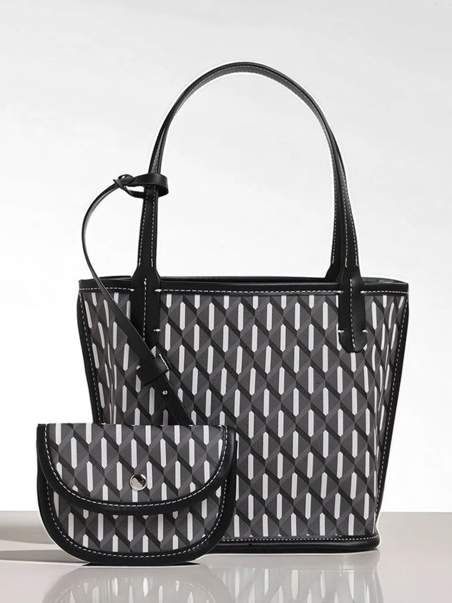 handbag in black with geometric and detachable purse
