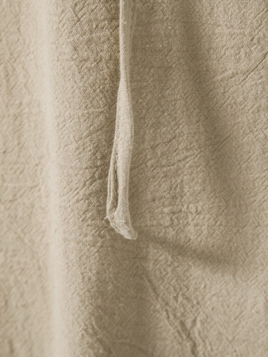 Men's beige cotton lace-up hooded top detail