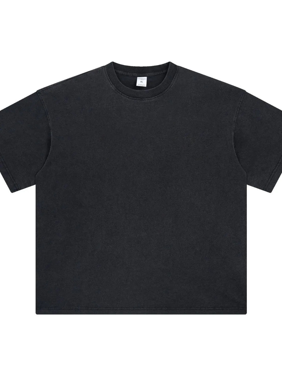 Oversized black washed cotton crewneck t-shirt with a relaxed fit and crew neckline.