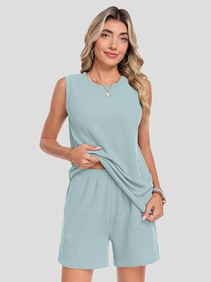 Ribbed knit set in Air Force Blue with sleeveless top and shorts, featuring pockets.