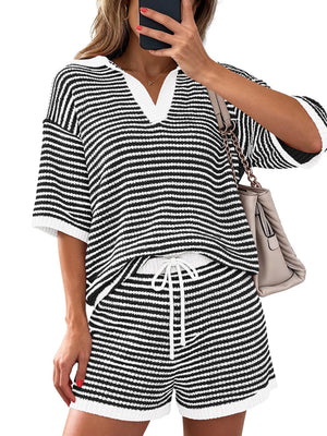 Striped knit polo shirt and drawstring shorts set in black and white.