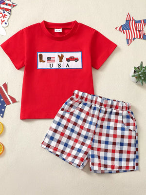 Red patriotic baby set with USA embroidery and plaid shorts.