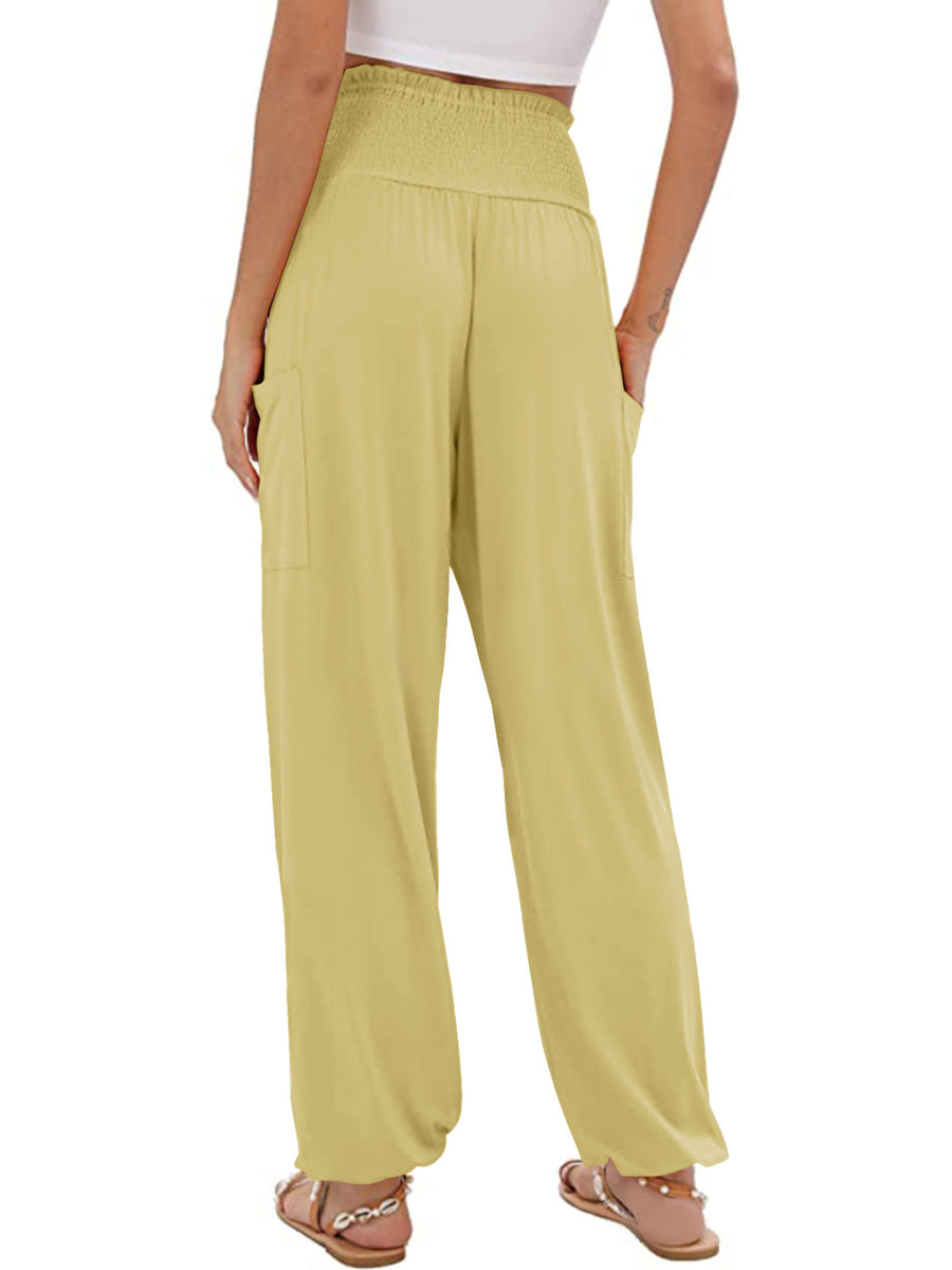 Yellow smocked waist harem pants with pockets and ankle cuffs