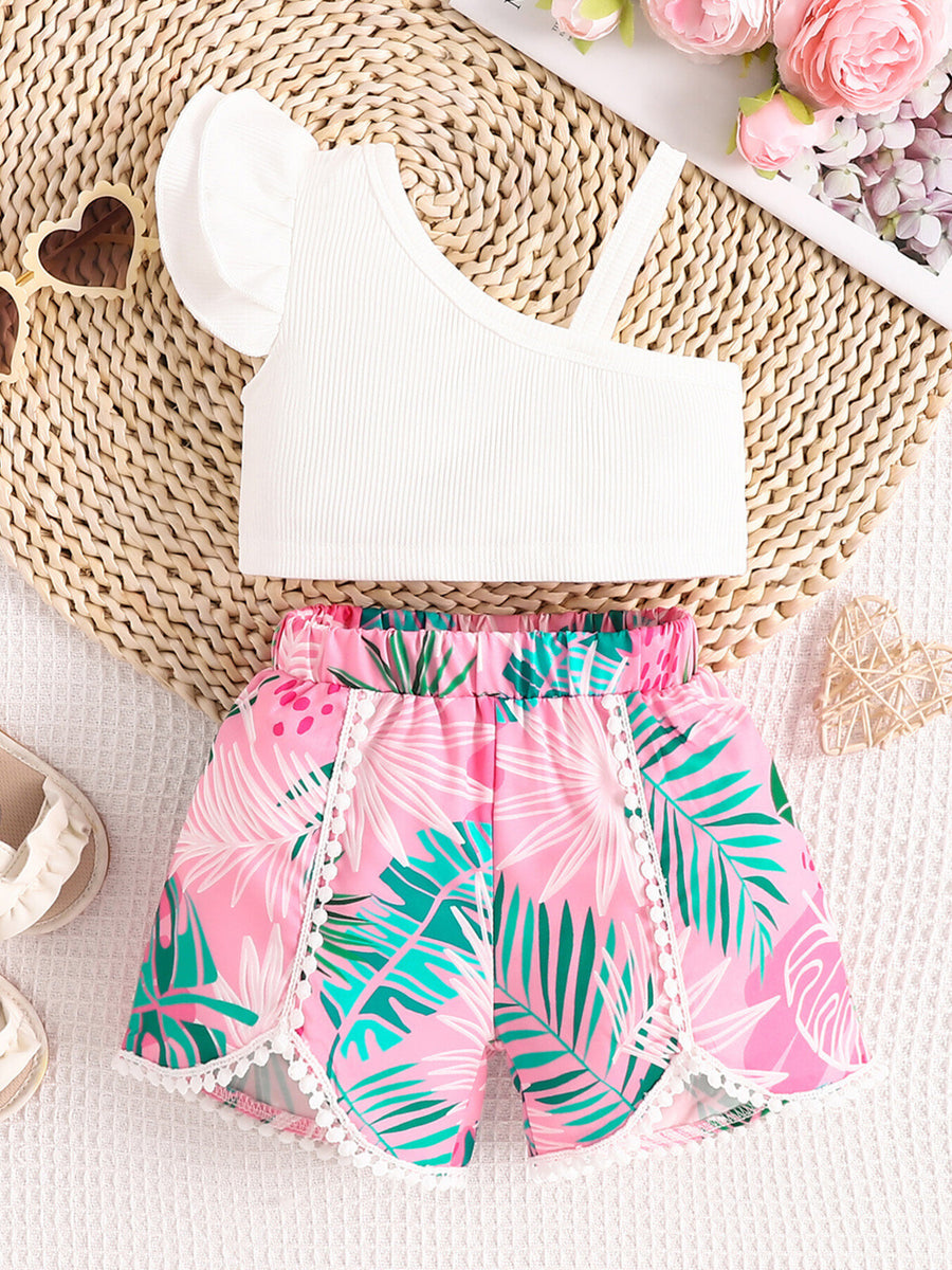 Baby girls' asymmetrical white ribbed top with ruffled sleeve and floral print pink shorts.