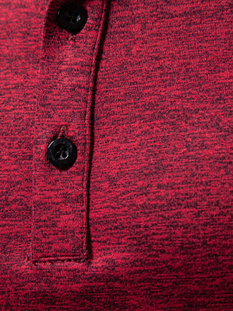 Burgundy mélange cotton henley tee with black buttons and curved hem detail.