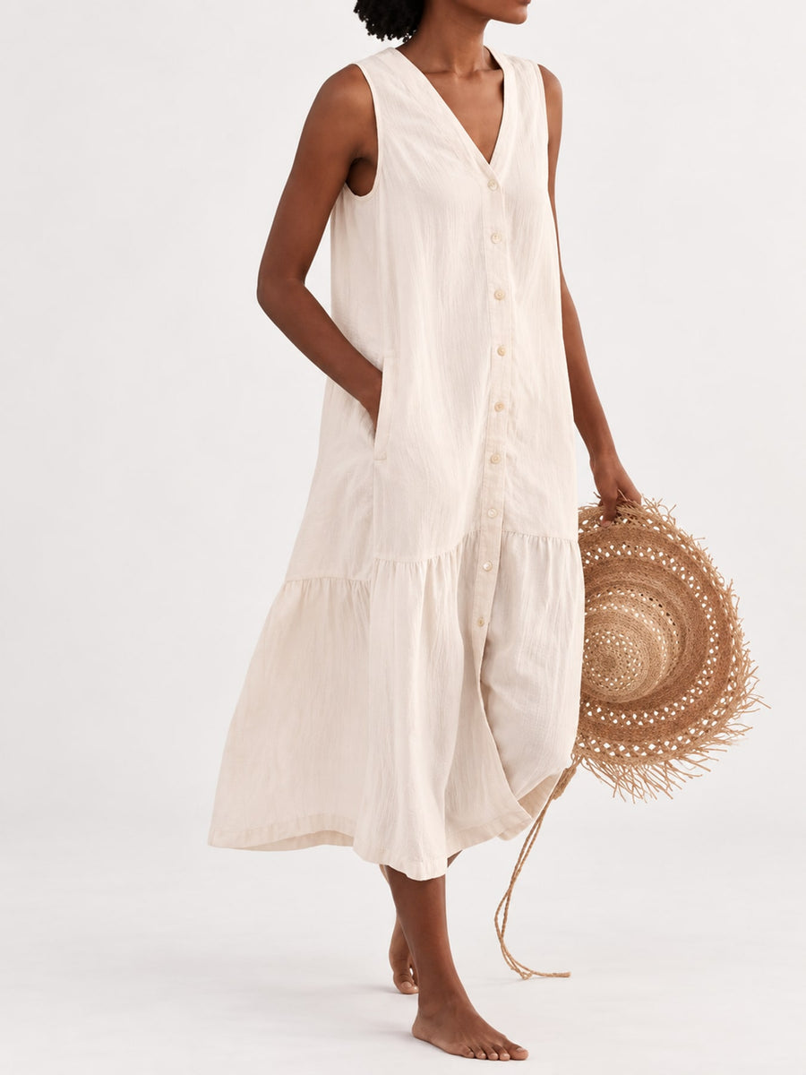 Creamy-white midi dress with buttoned and sleeveless