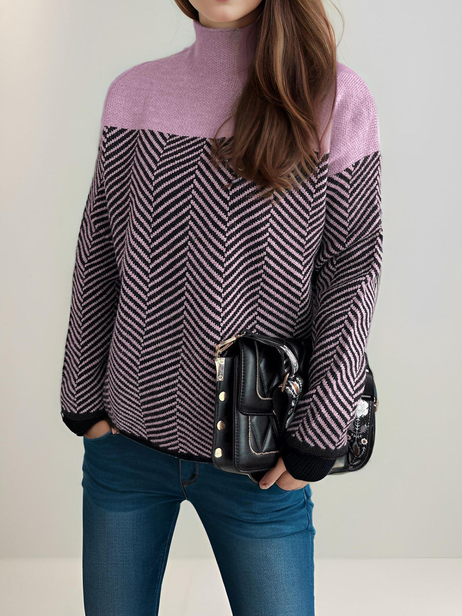 Chevron knit turtleneck sweater in lavender and black with a chevron pattern.